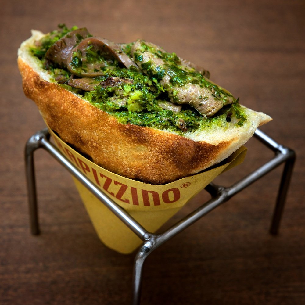Trapizzino with ox tongue in green sauce. Image Credit: Trapizzino